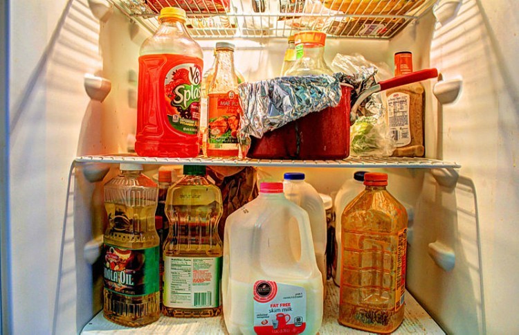 fridge filled with various food items
