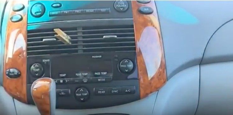 air freshener clothespin in car vent