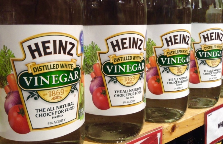 Shelf of bottles of Heinz distilled white vinegar