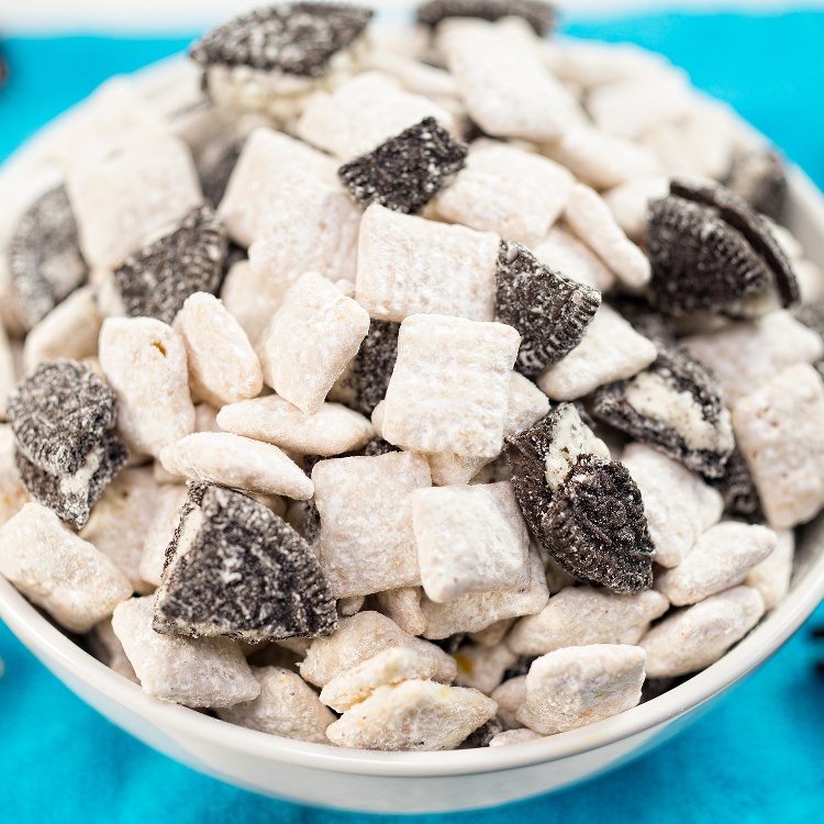 Three easy Muddy Buddies flavors that taste like summer: Cake Batter, Orange Creamsicle, and Cookies & Cream. These no-bake 10-minute treats are pure fun.