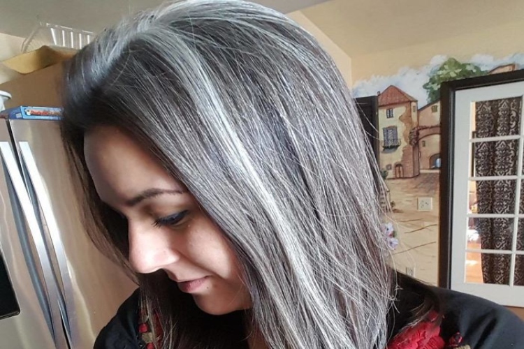 Image of young lady with grey hair.